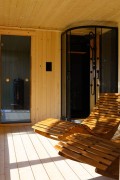 Kompleksowy domek wellness z sauną i jacuzzi – Mokko, producent luksusowych stref relaksu.